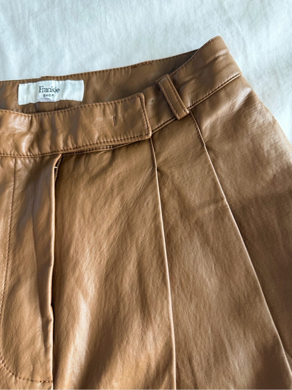 The Frankie Shop Pernille Pleated Faux Leather Shorts in Brown - Picture 9 of 16